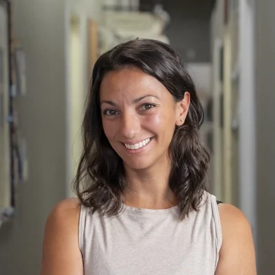 A headshot of Dr. Brittany Leopardi, a chiropractor at Avenue One Health Center.