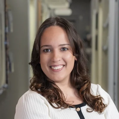 A headshot of Dr. Michelle Varela-Rosario, a chiropractor at Avenue One Health Center.